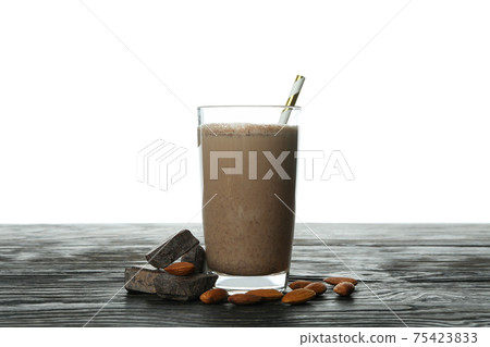 Chocolate milkshake, almond and chocolate on wooden table isolated on white background 75423833