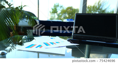 Closeup photo of laptop computer with open top. Blank screen 75424696