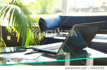 Closeup photo of laptop computer with open top. Blank screen 75424703
