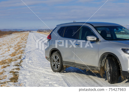 Snow country_driving image of snowy road 75427983