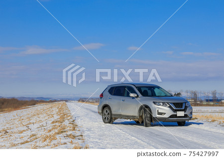 Snow country_driving image of snowy road 75427997