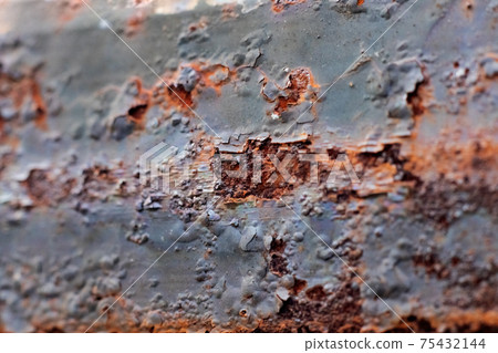 Red rust on black iron close up 75432144