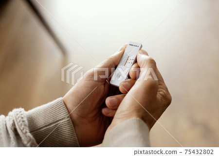 man gets a positive result in his covid-19 test 75432802