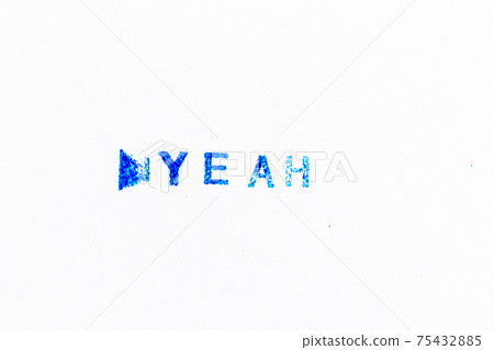 Blue color ink of rubber stamp in word yeah on white paper background 75432885