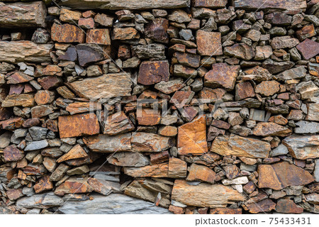 Slate slabs texture background. Pattern of black slate wall Slate slabs texture background. Pattern of black slate wall 75433431