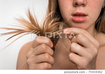 Hair problems - brittle, damaged, dry and loss hair concept Hair problems - brittle, damaged, dry and loss hair concept 75434362
