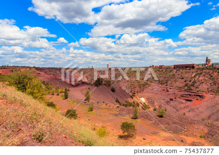 View of huge iron ore quarry in Kryvyi Rih, Ukraine. Open pit mining View of huge iron ore quarry in Kryvyi Rih, Ukraine. Open pit mining 75437877