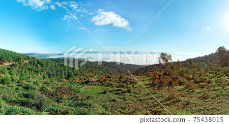 beautiful clouds on the background of the snowy Mount Hermon in winter 75438015
