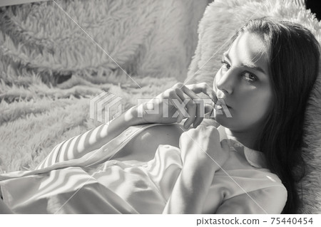 woman in sun light woman in sun light 75440454