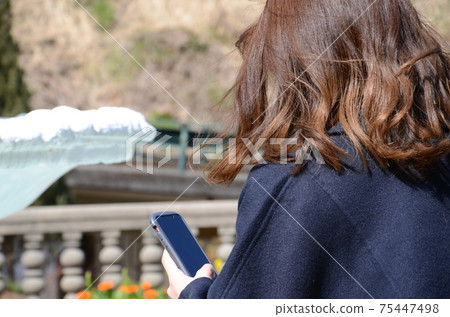 Walking smartphone Walking smartphone 75447498
