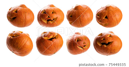 A set of glowing pumpkins. Isolated on a white background A set of glowing pumpkins. Isolated on a white background 75449335