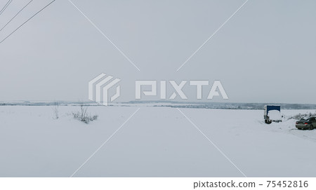 Winter frosty landscape of the river with broken ice 75452816