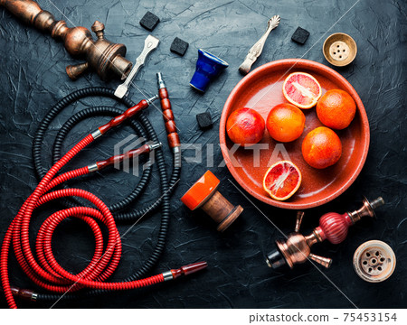 Smoking hookah with grapefruit flavor 75453154