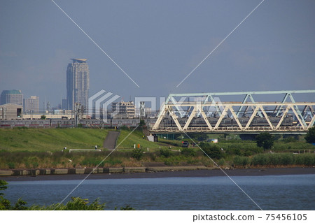 Tobu Isesaki Line: 10000 series train crossing the Arakawa River 75456105
