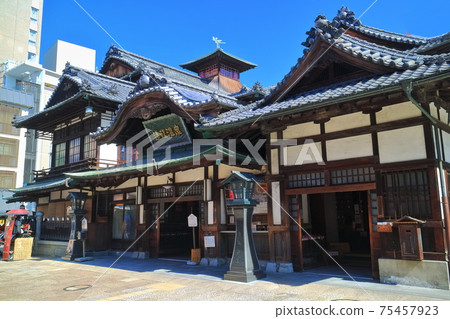 [Ehime Prefecture] Dogo Onsen Main Building under clear skies 75457923