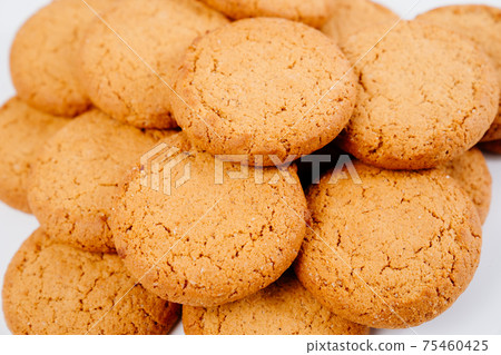 round oatmeal cookies. sweet treat to tea. round oatmeal cookies. sweet treat to tea. 75460425