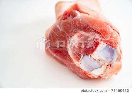 raw pork knuckle on a white background. butcher shop. raw pork knuckle on a white background. butcher shop. 75460426