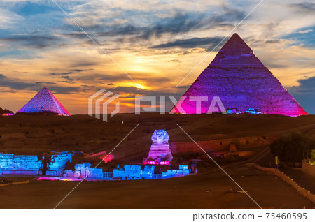 The Great Pyramids of Egypt and the Sphinx, enlighted at night, Giza 75460595