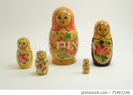 five traditional Russian nesting dolls on white five traditional Russian nesting dolls on white 75463206