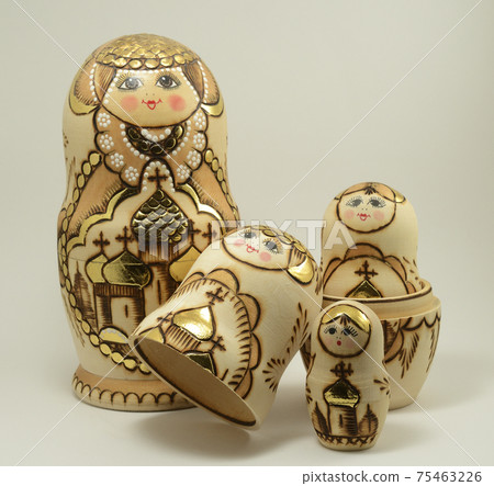 traditional Russian nesting dolls on white traditional Russian nesting dolls on white 75463226