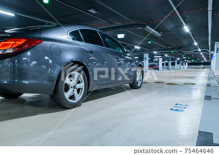 Parking lot. Car lot parking space in underground city garage. Empty road asphalt background. Ground floor for car parking. Parking lot. Car lot parking space in underground city garage. Empty road asphalt background. Ground floor for car parking. 75464646