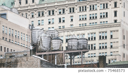 Old water towers, one of New York City symbols, USA. Old water towers, one of New York City symbols, USA. 75468573