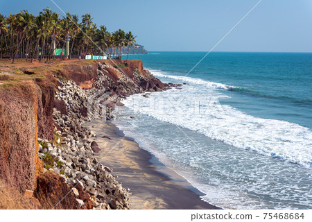 Varkala, Kerala, India. Steep coast, palm trees and sea horizon Varkala, Kerala, India. Steep coast, palm trees and sea horizon 75468684
