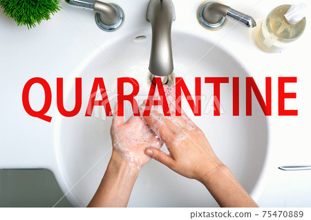 Quarantine theme with person washing their hands Quarantine theme with person washing their hands 75470889