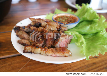 grilled beef , roasted beef or beef steak 75476356