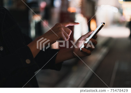 Hold your smartphone on the road Hold your smartphone on the road 75478429