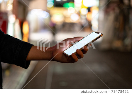 Hold your smartphone on the road Hold your smartphone on the road 75478431