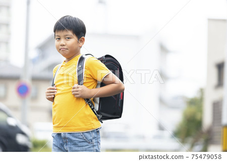Male elementary school student Male elementary school student 75479058