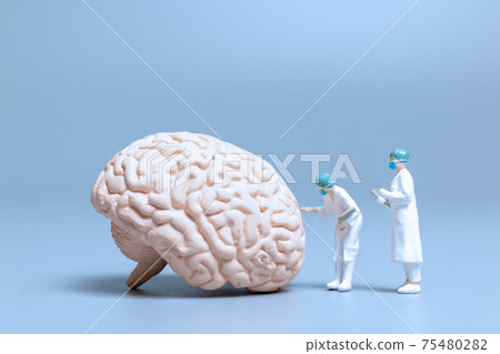Miniature Doctor checking and analysis alzheimer's disease and dementia of brain 75480282