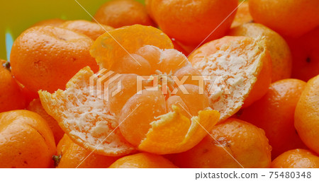 Fresh mandarin oranges fruit or tangerines in basket. 75480348