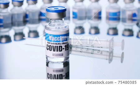 Glass vials for Covid-19 vaccine in laboratory. Group of Coronavirus vaccine bottles. Medicine in ampoules. 75480385