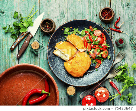 Chicken kiev cutlet with salad Chicken kiev cutlet with salad 75483647