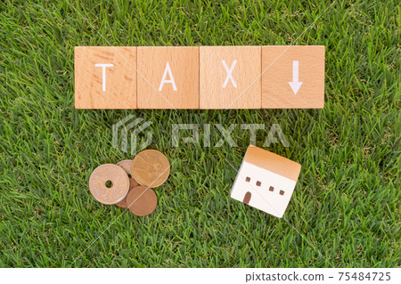 Tax reduction | Building blocks, coins and house toys with "TAX" written on them Tax reduction | Building blocks, coins and house toys with "TAX" written on them 75484725