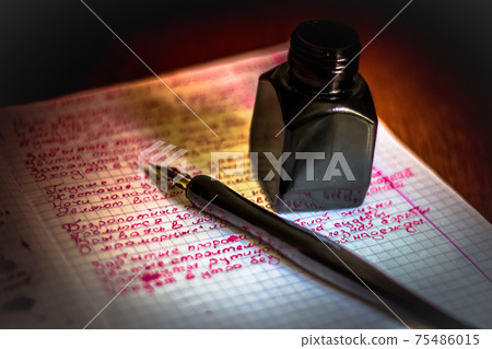 Text book with feather and inkpot poem on sheet 75486015