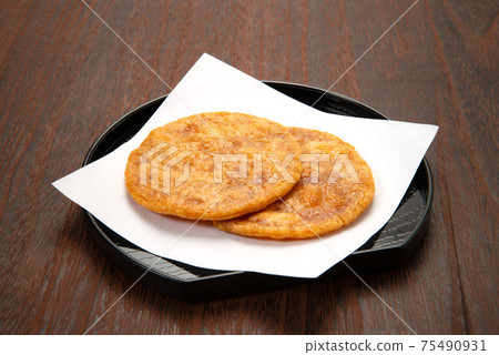 Wetting rice cracker 75490931