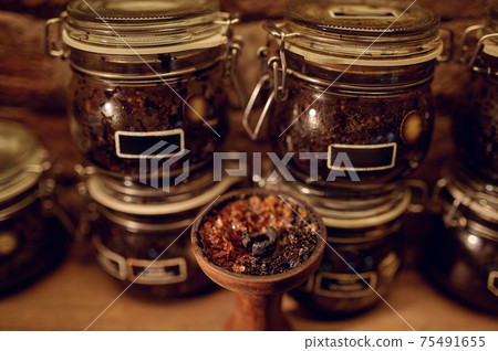 Hookah bowl with tobacco closeup, nobody 75491655