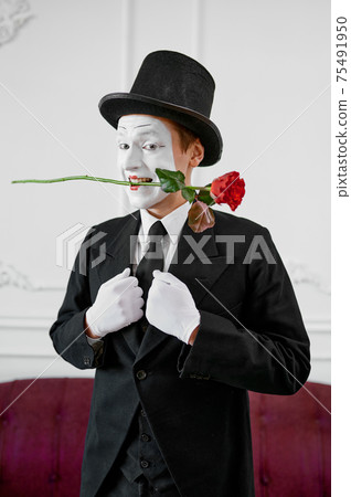 Mime artist, gentleman in love with a rose Mime artist, gentleman in love with a rose 75491950