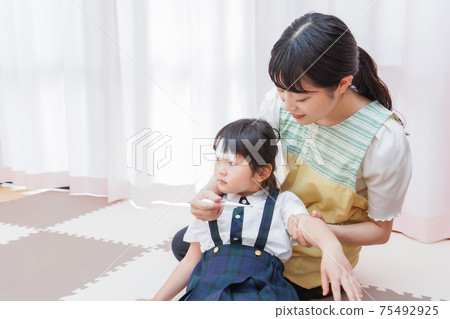 A kindergarten child with a fever A kindergarten child with a fever 75492925