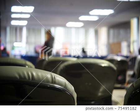 blur lonesome abandoned almost empty passenger's waiting room in front of gate in a previous tourist destination airport in COVID-19 pandemic era blur lonesome abandoned almost empty passenger's waiting room in front of gate in a previous tourist destination airport in COVID-19 pandemic era 75495182