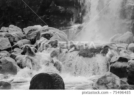 Oxal Aurafoss Waterfall Monochrome in the Golden Circle in Thingvellir Park in Winter Iceland in Scandinavia 75496485