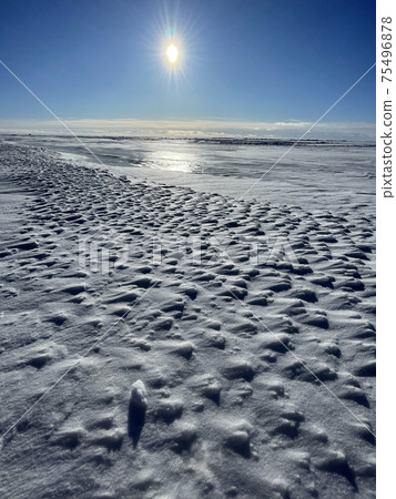Ice slopes in sunny winter day, transparent ice of blue color, purely blue sky, long shadows, a pure snow-covered virgin soil, snow barkhans, Ice slopes in sunny winter day, transparent ice of blue color, purely blue sky, long shadows, a pure snow-covered virgin soil, snow barkhans, 75496878
