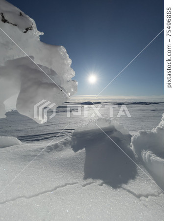 Ice slopes in sunny winter day, transparent ice of blue color, purely blue sky, long shadows, a pure snow-covered virgin soil, snow barkhans, Ice slopes in sunny winter day, transparent ice of blue color, purely blue sky, long shadows, a pure snow-covered virgin soil, snow barkhans, 75496888