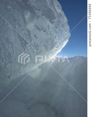 Ice slopes in sunny winter day, transparent ice of blue color, purely blue sky, long shadows, a pure snow-covered virgin soil, snow barkhans, Ice slopes in sunny winter day, transparent ice of blue color, purely blue sky, long shadows, a pure snow-covered virgin soil, snow barkhans, 75496898