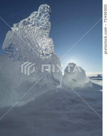 Ice slopes in sunny winter day, transparent ice of blue color, purely blue sky, long shadows, a pure snow-covered virgin soil, snow barkhans, Ice slopes in sunny winter day, transparent ice of blue color, purely blue sky, long shadows, a pure snow-covered virgin soil, snow barkhans, 75496900