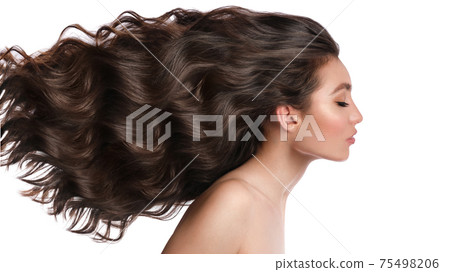 Beautiful brown-haired girl with a perfectly curls hair, and classic make-up. Beauty face and hair. Beautiful brown-haired girl with a perfectly curls hair, and classic make-up. Beauty face and hair. 75498206