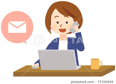 A woman sending an email on her laptop while making a phone call 75500689